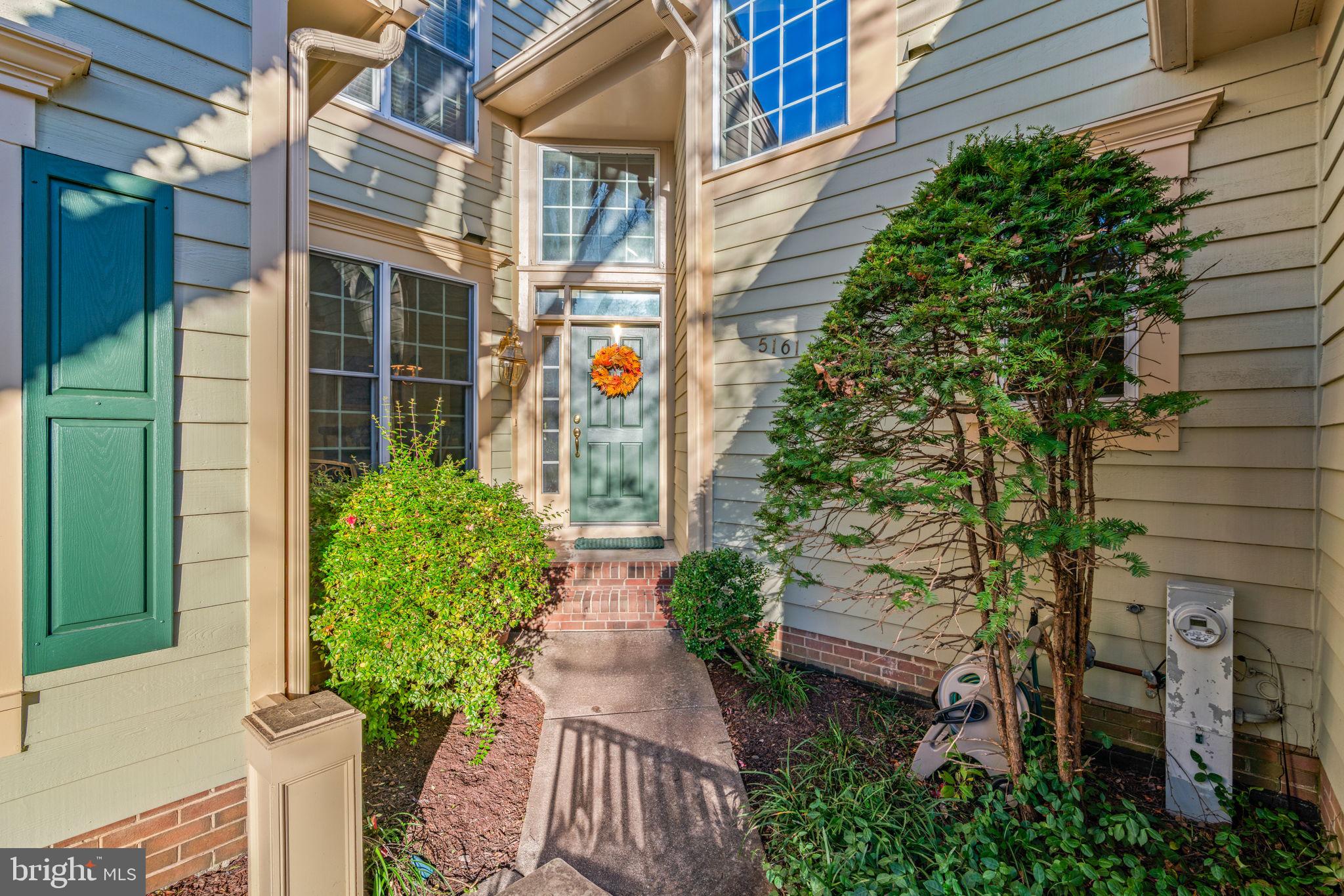 5161 Harpers Farm Road, Unit 27 Columbia, MD 21044 - Photo 4 of 55 a view of a pathway of the house front of house