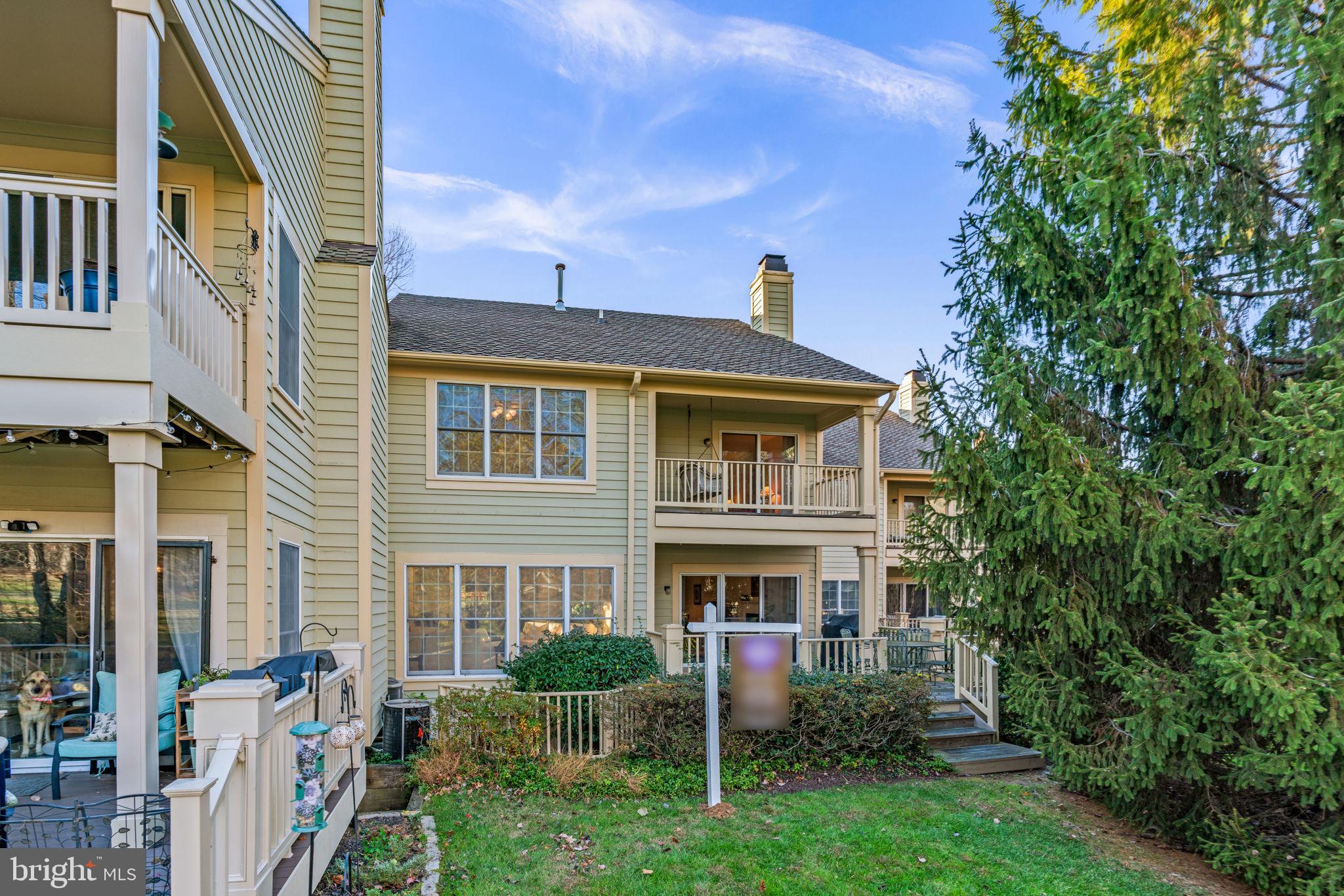 5161 Harpers Farm Road, Unit 27 Columbia, MD 21044 - Photo 42 of 55 a front view of a house with a yard