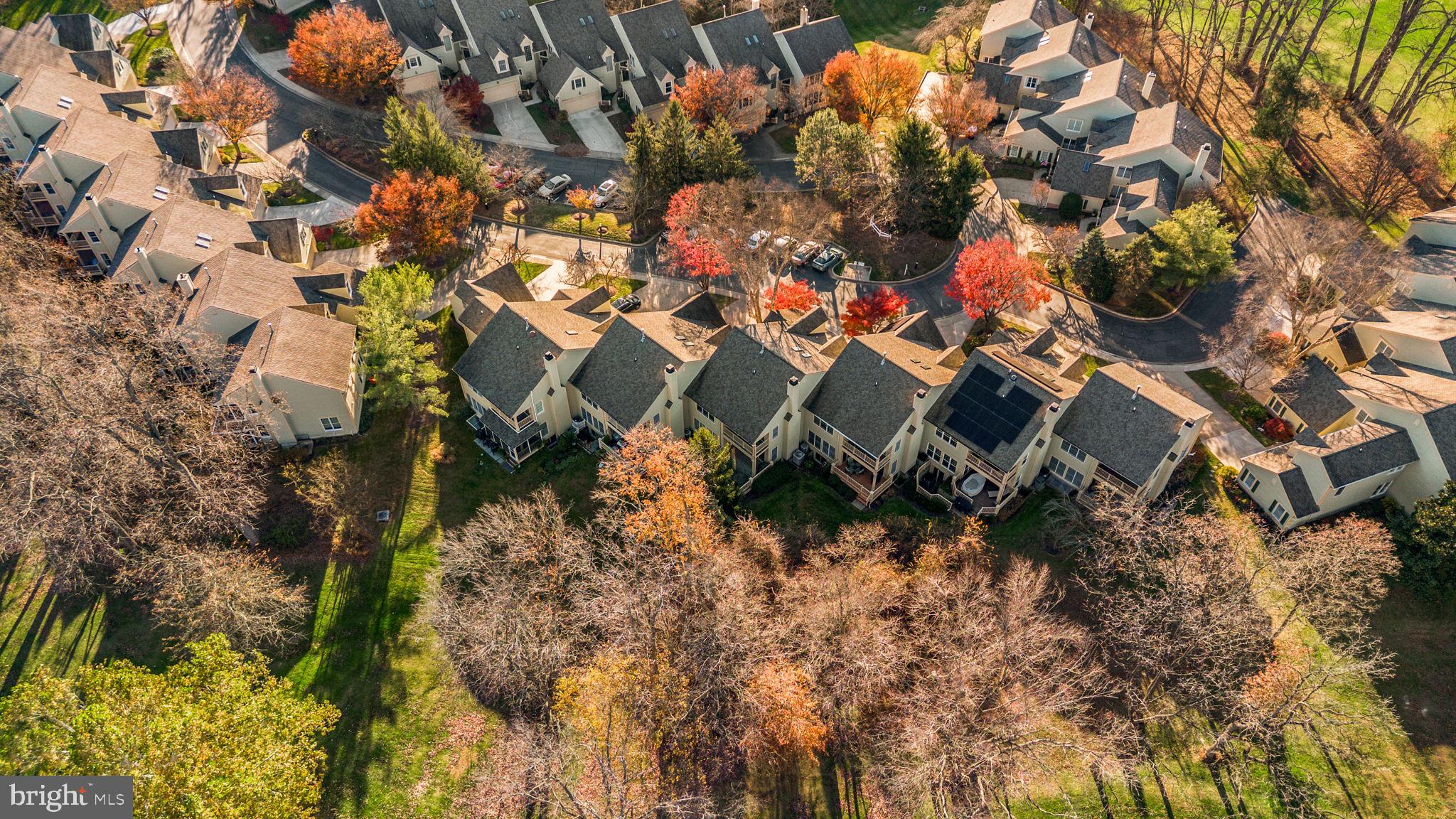 5161 Harpers Farm Road, Unit 27 Columbia, MD 21044 - Photo 53 of 55 a backyard of a house with lots of green space