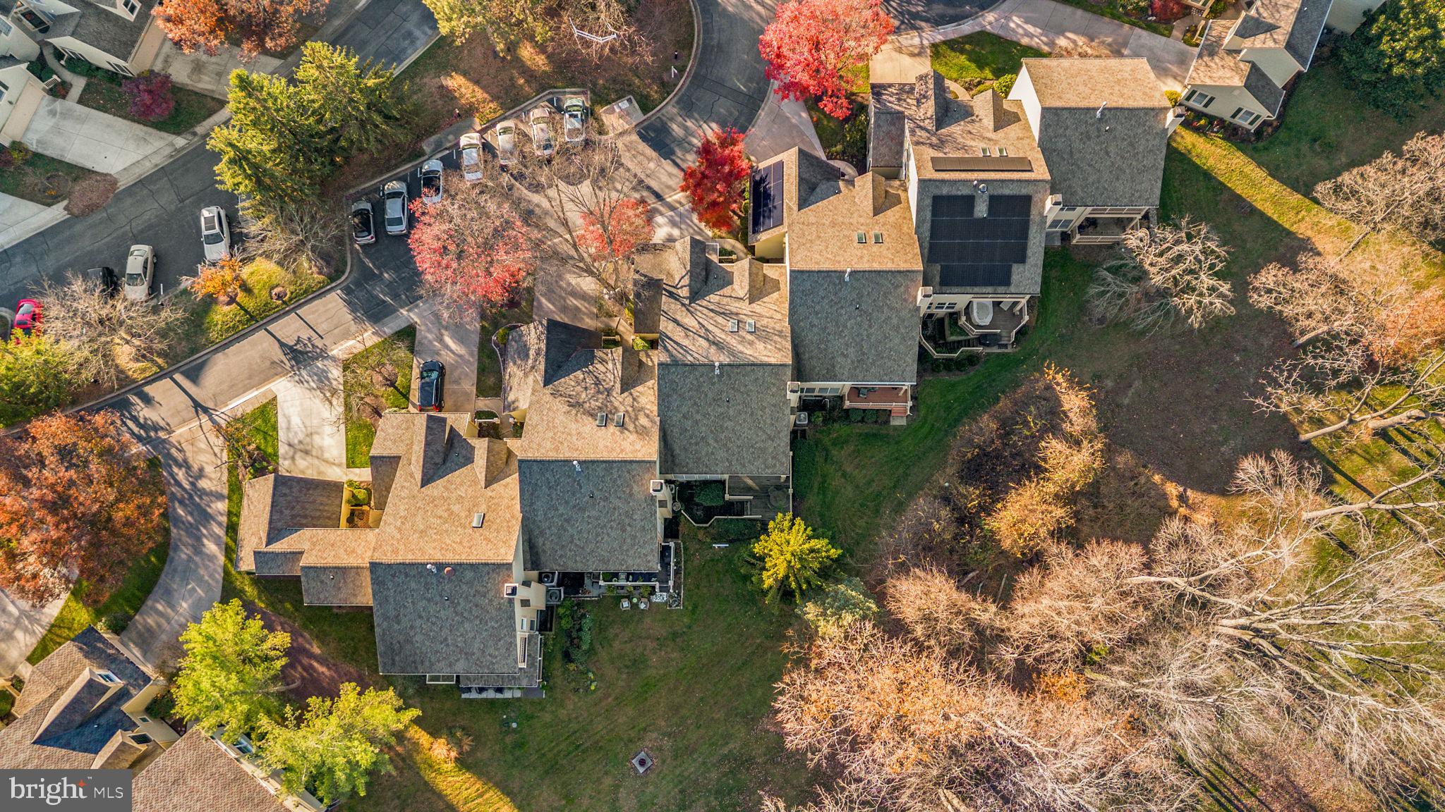 5161 Harpers Farm Road, Unit 27 Columbia, MD 21044 - Photo 54 of 55 an aerial view of residential houses with outdoor space