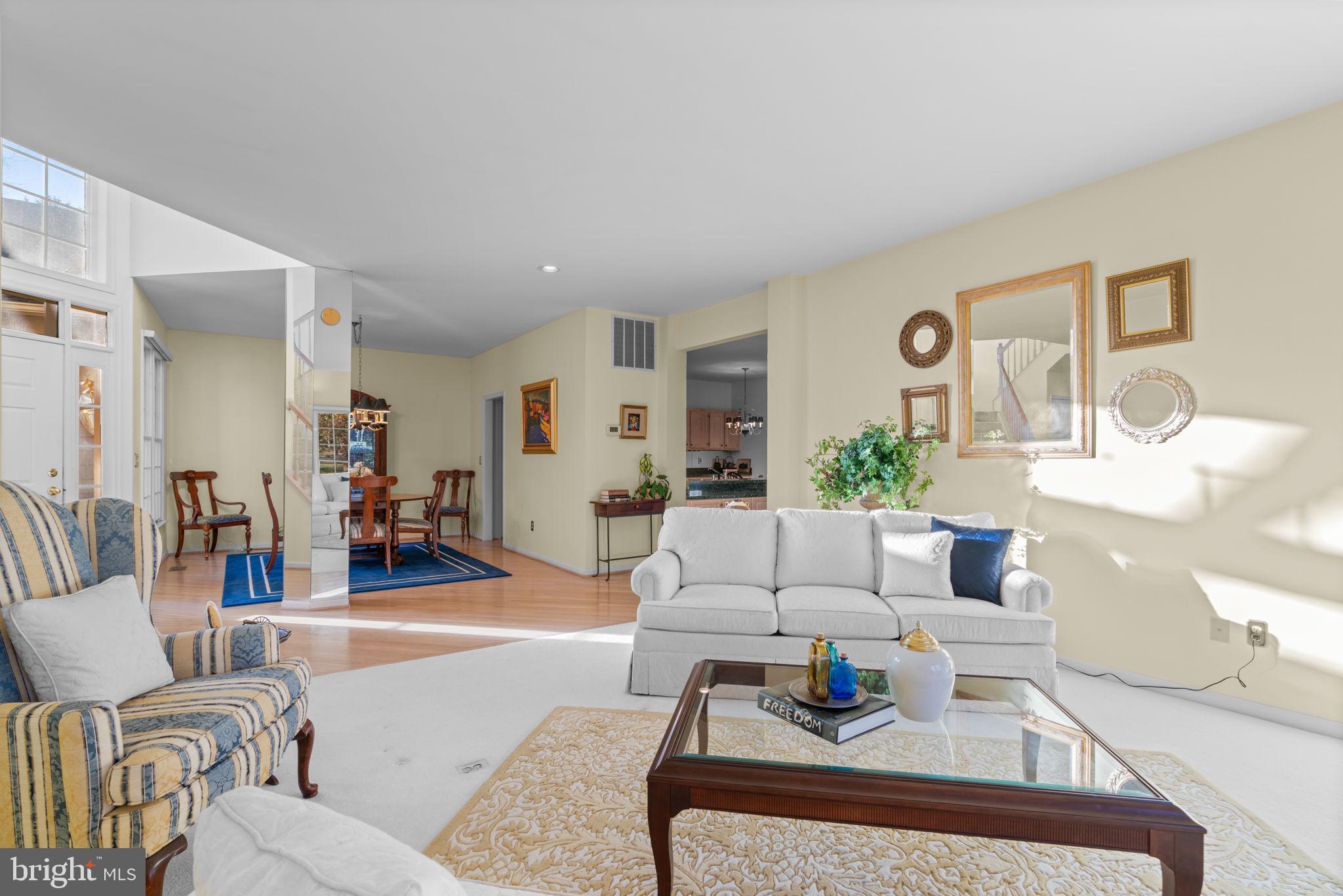 5161 Harpers Farm Road, Unit 27 Columbia, MD 21044 - Photo 8 of 55 a living room with furniture and wooden floor
