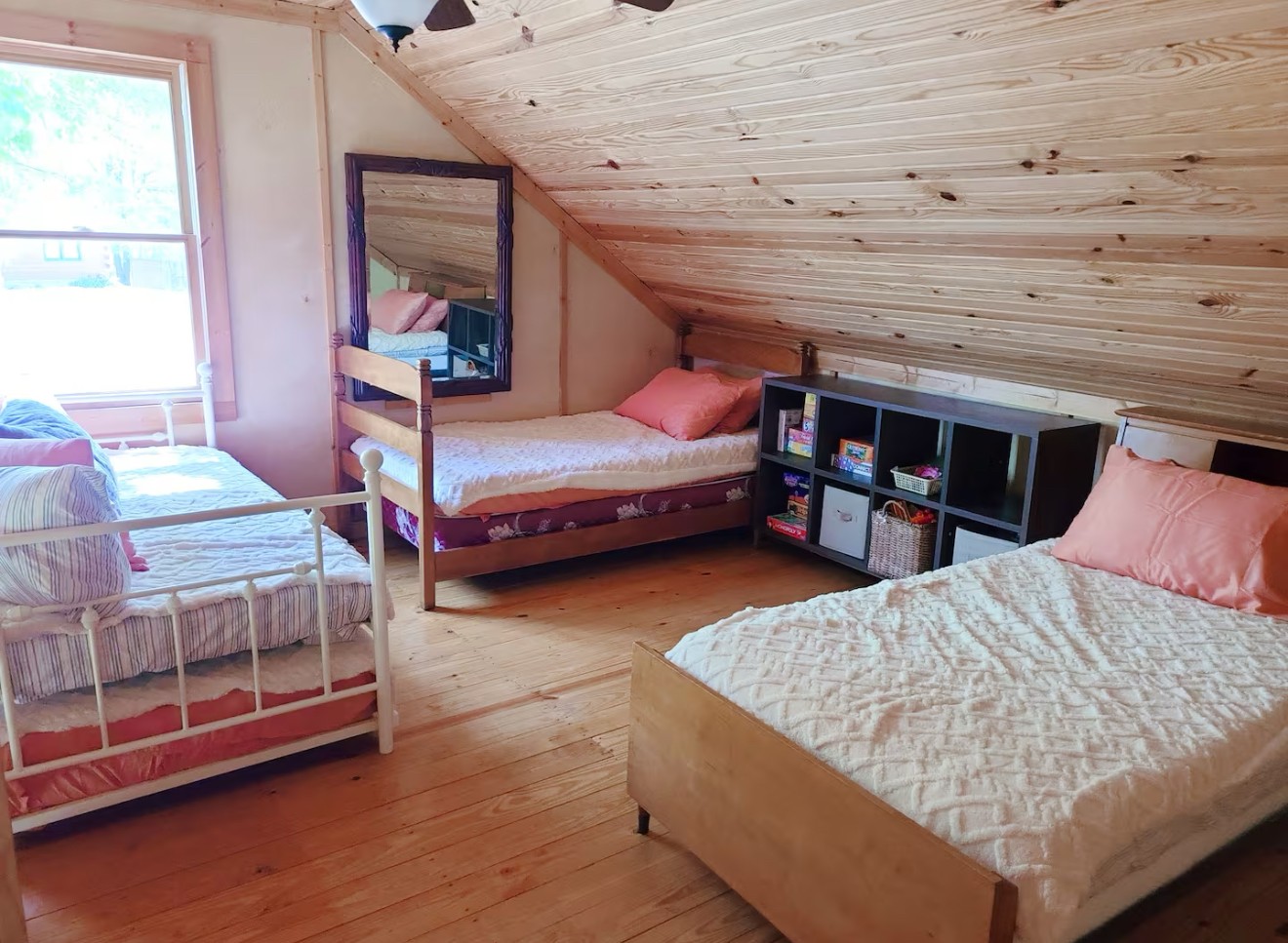 80 Tater Bug Lane Clifton, TN 38425 - Photo 12 of 25 a bedroom with a bed and a night stand