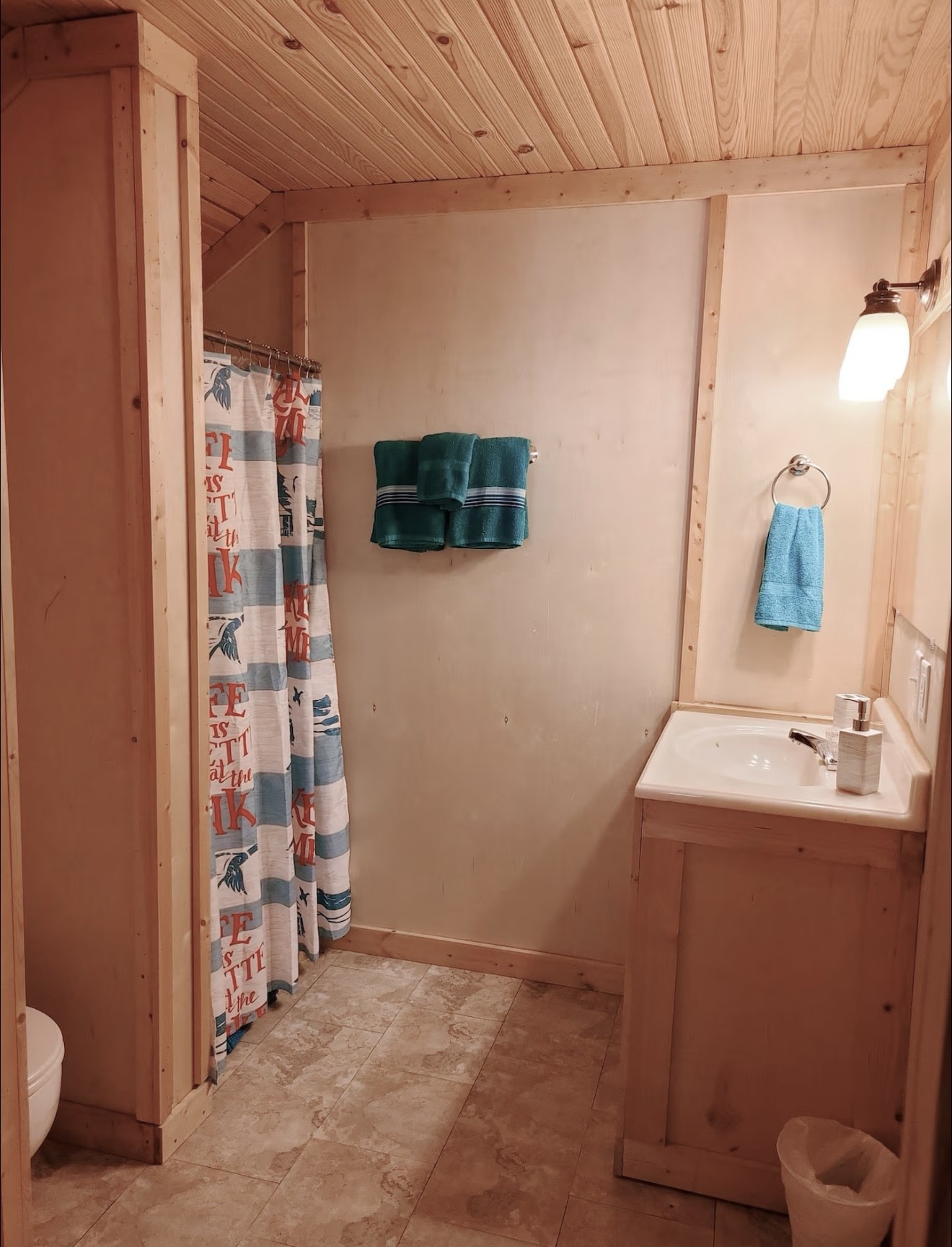 80 Tater Bug Lane Clifton, TN 38425 - Photo 15 of 25 a bathroom with a sink toilet and shower