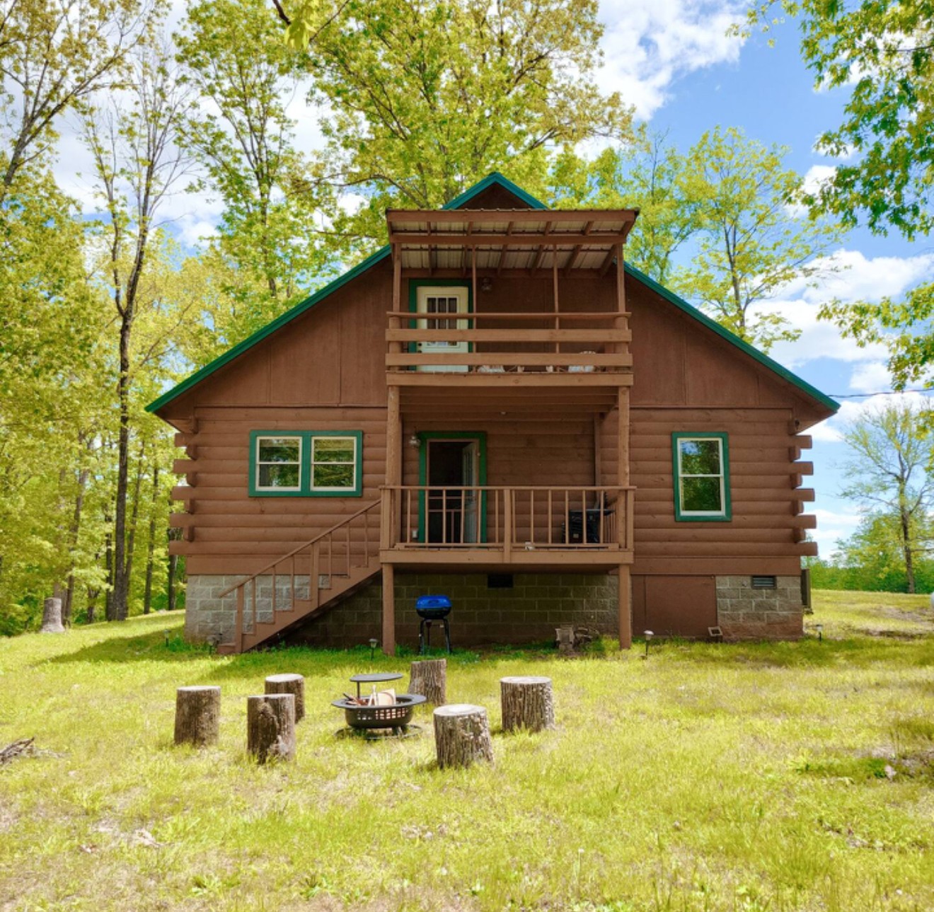 80 Tater Bug Lane Clifton, TN 38425 - Photo 20 of 25 a view of a house with pool and a chairs in a yard