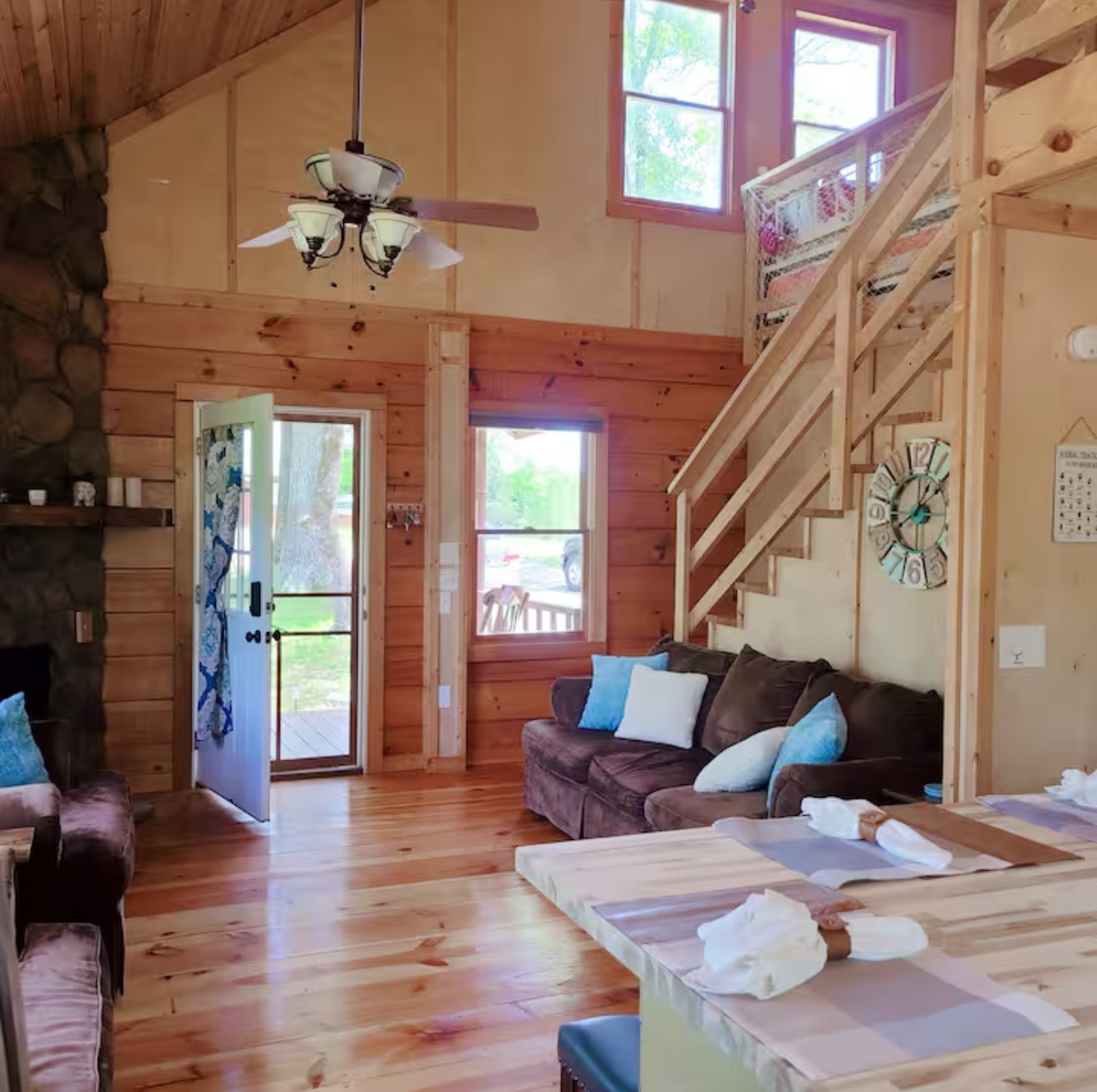 80 Tater Bug Lane Clifton, TN 38425 - Photo 24 of 25 a living room with furniture and a chandelier