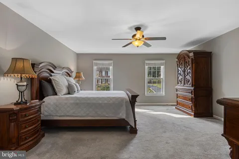 a bathroom with a sink a vanity and a mirror