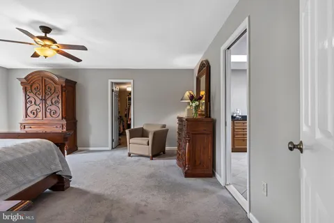 a view of entryway with wooden stairs