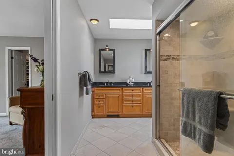 an aerial view of a house with a big yard