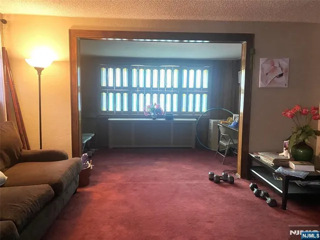 a room with furniture and a window