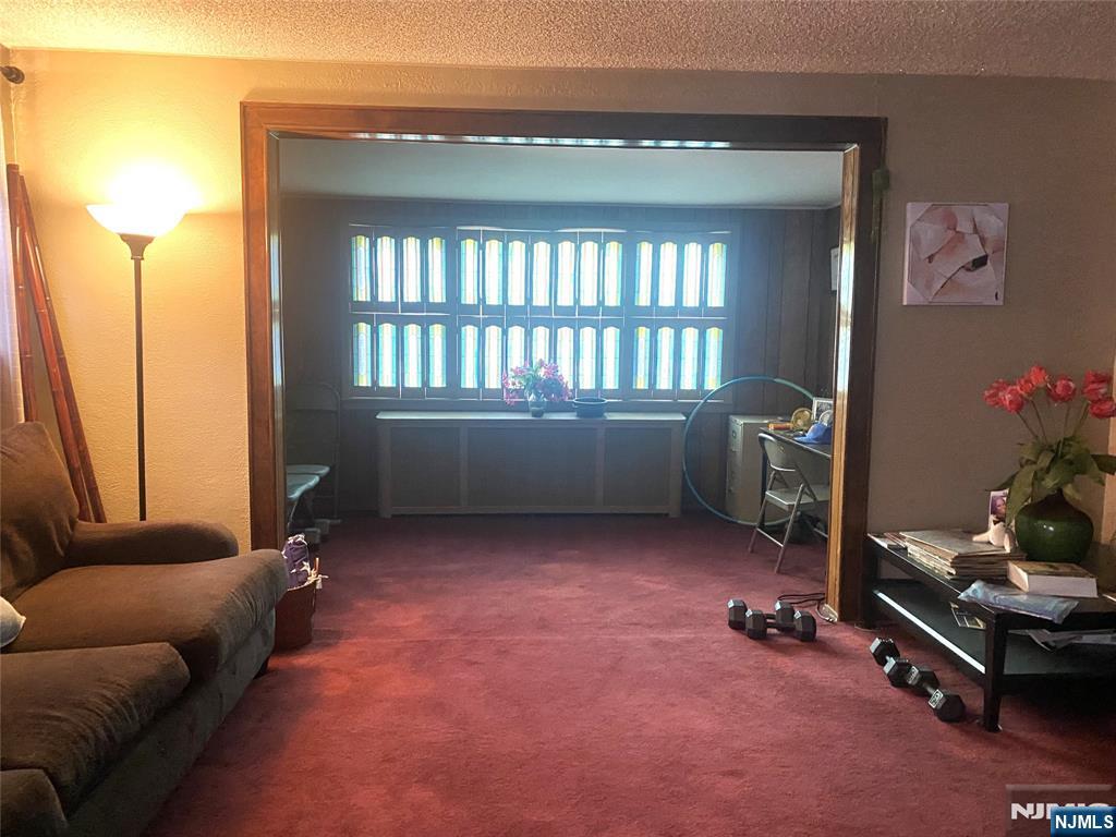 857 Garrison Avenue Teaneck, NJ 07666 - Photo 4 of 5 a room with furniture and a window