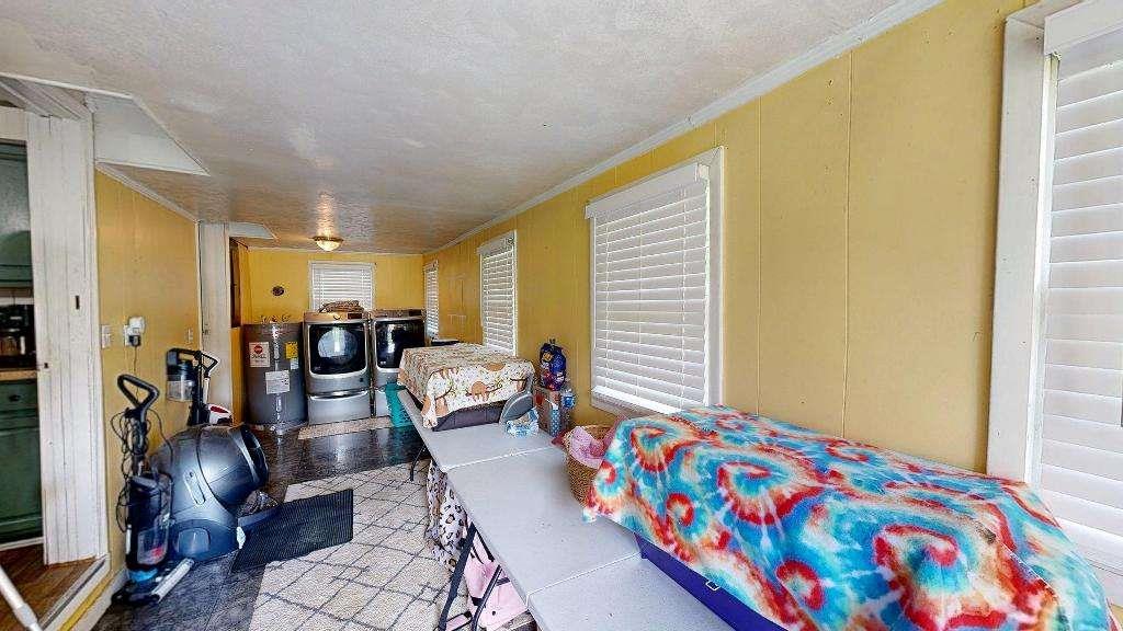 15 Aragon Road Aragon, GA 30104 - Photo 21 of 33 a bed room with furniture and a window