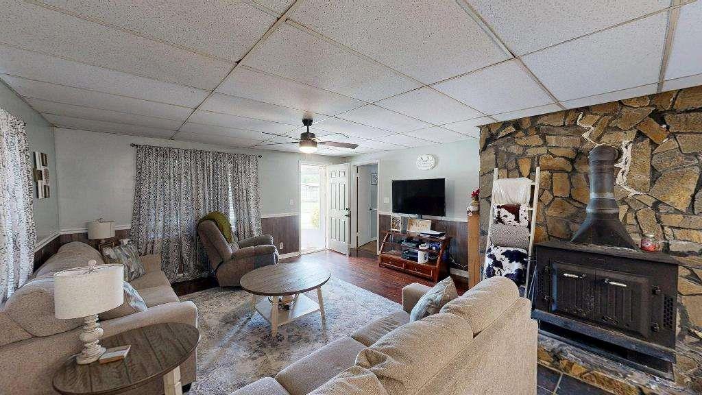15 Aragon Road Aragon, GA 30104 - Photo 8 of 33 a living room with furniture and a flat screen tv