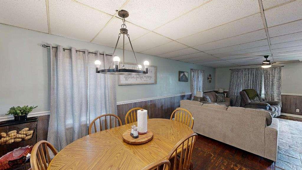 15 Aragon Road Aragon, GA 30104 - Photo 10 of 33 a view of a dining room with furniture a chandelier and wooden floor