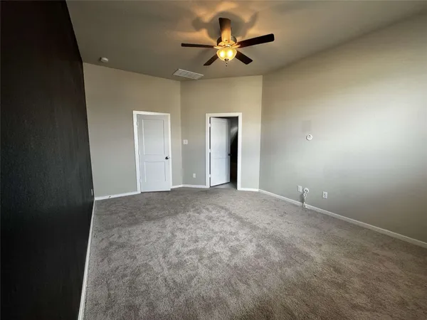 a bathroom with a bathtub sink and mirror