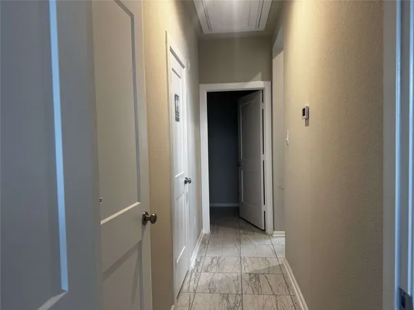 a bathroom with a glass door shower