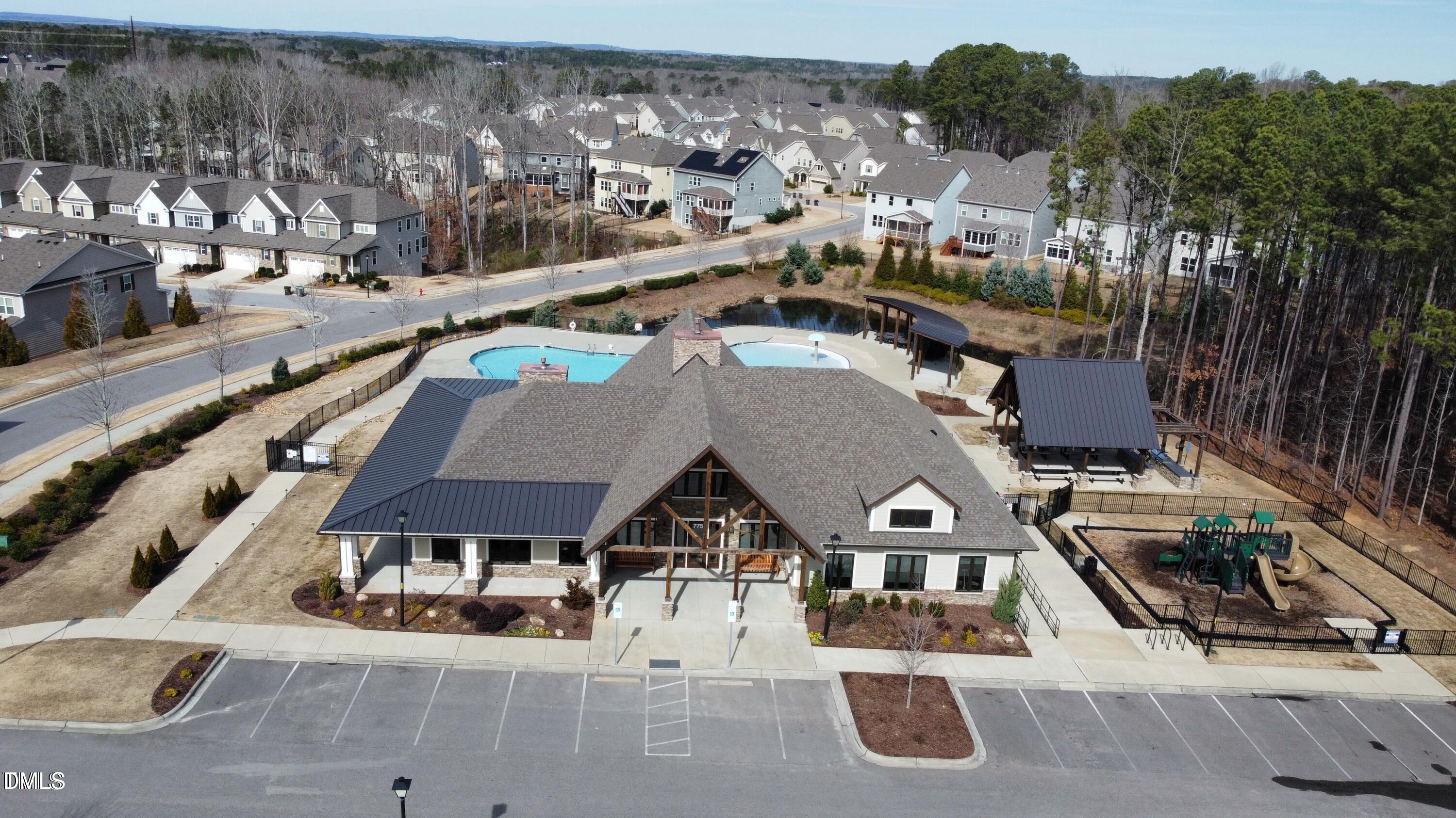 2555 Rambling Creek Road Apex, NC 27523 - Photo 18 of 23 a view of multiple houses with a street