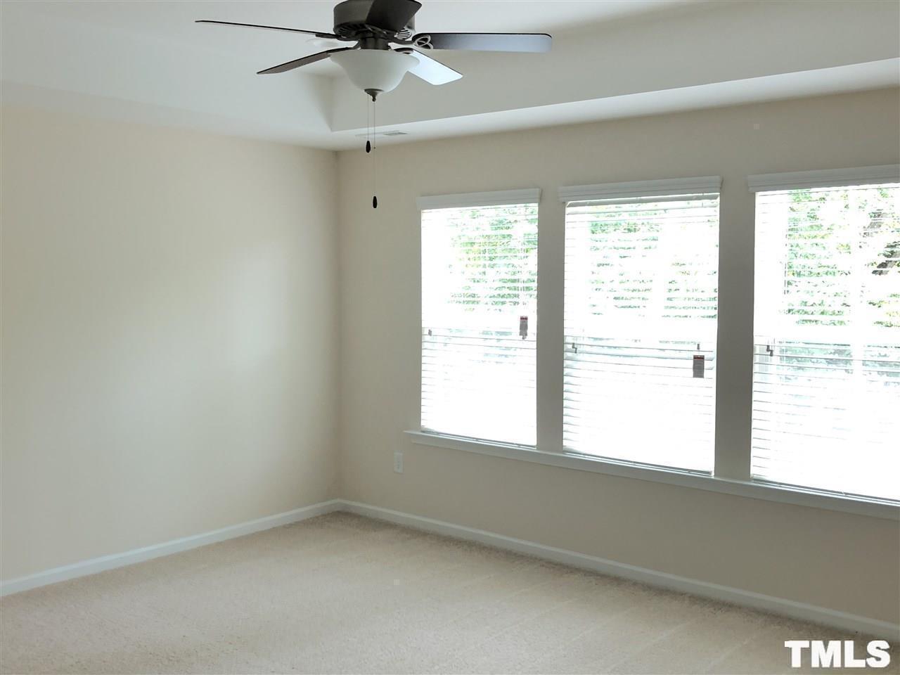 2555 Rambling Creek Road Apex, NC 27523 - Photo 7 of 23 a view of an empty room with a window