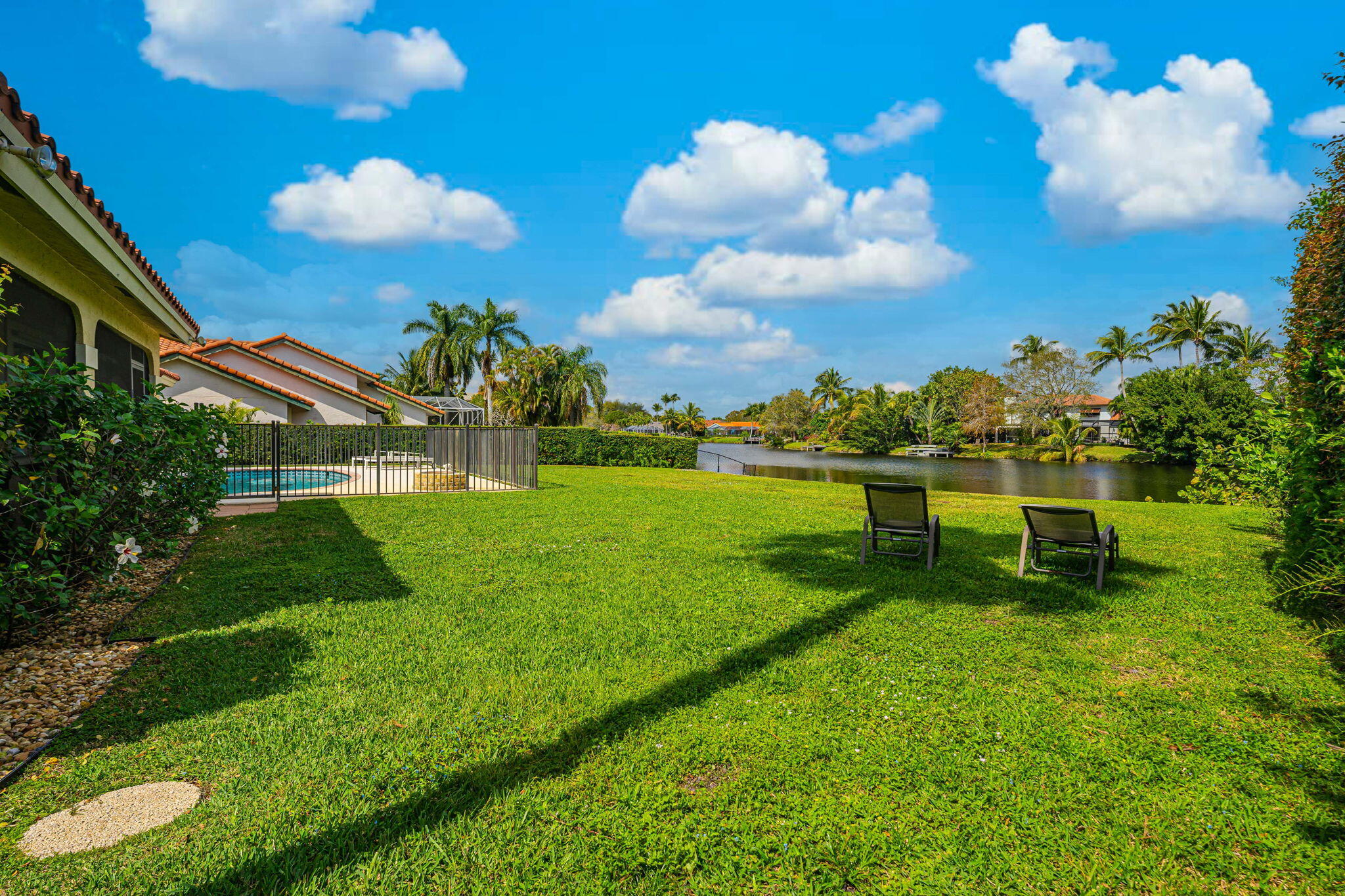 12715 Kingsway Road Wellington, FL 33414 - Photo 33 of 36 a view of a park with large trees