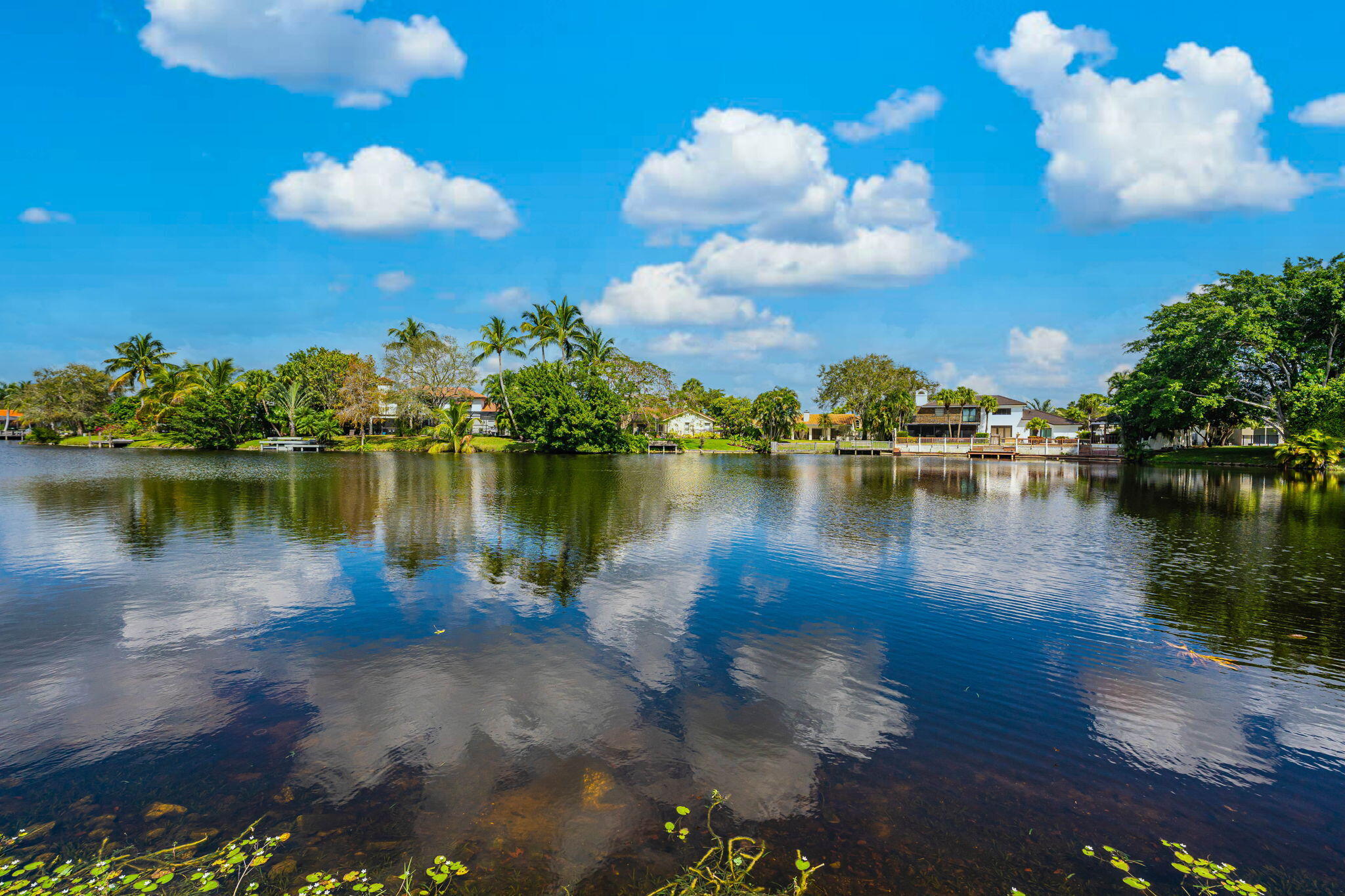 12715 Kingsway Road Wellington, FL 33414 - Photo 34 of 36 a view of a lake with houses