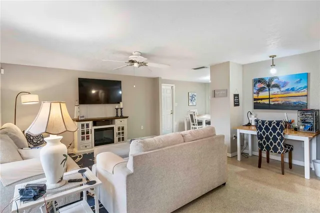 a kitchen with stainless steel appliances a refrigerator and a stove