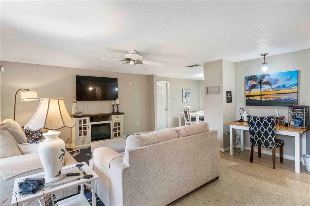 333 Hile Lane Punta Gorda, FL 33982 - Photo 18 of 72 a living room with furniture and a flat screen tv