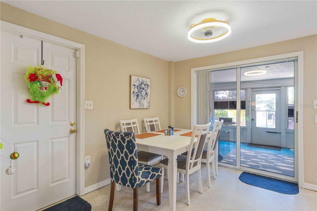 333 Hile Lane Punta Gorda, FL 33982 - Photo 21 of 72 a view of a dining room with furniture window and wooden floor
