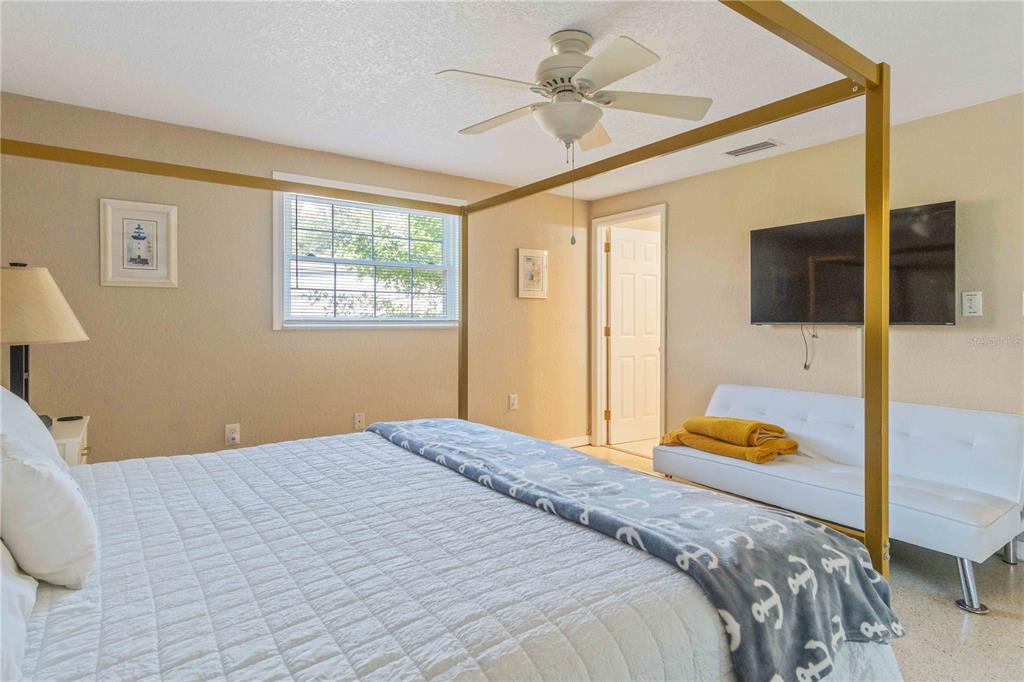 333 Hile Lane Punta Gorda, FL 33982 - Photo 33 of 72 a bedroom with a bed window and a flat screen tv