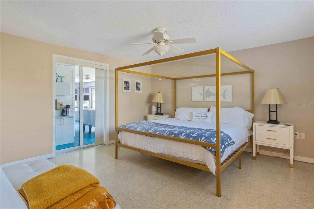 333 Hile Lane Punta Gorda, FL 33982 - Photo 35 of 72 a bedroom with a bed and wooden floor