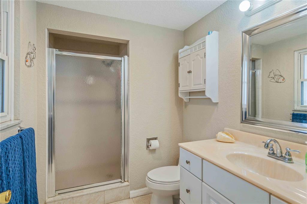 333 Hile Lane Punta Gorda, FL 33982 - Photo 39 of 72 a bathroom with a granite countertop sink toilet and shower