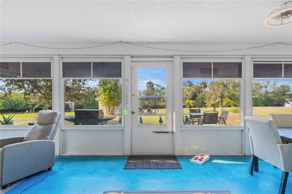 333 Hile Lane Punta Gorda, FL 33982 - Photo 43 of 72 a living room with furniture and a large window