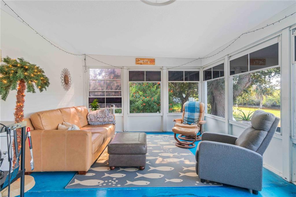 333 Hile Lane Punta Gorda, FL 33982 - Photo 45 of 72 a living room with furniture and a large window