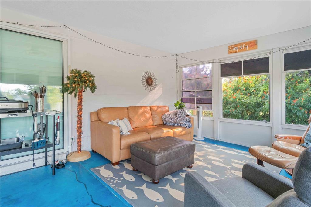333 Hile Lane Punta Gorda, FL 33982 - Photo 46 of 72 a living room with furniture and a large window
