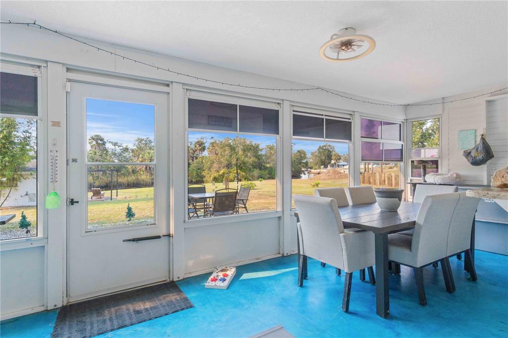 333 Hile Lane Punta Gorda, FL 33982 - Photo 48 of 72 a dining room with furniture and wooden floor