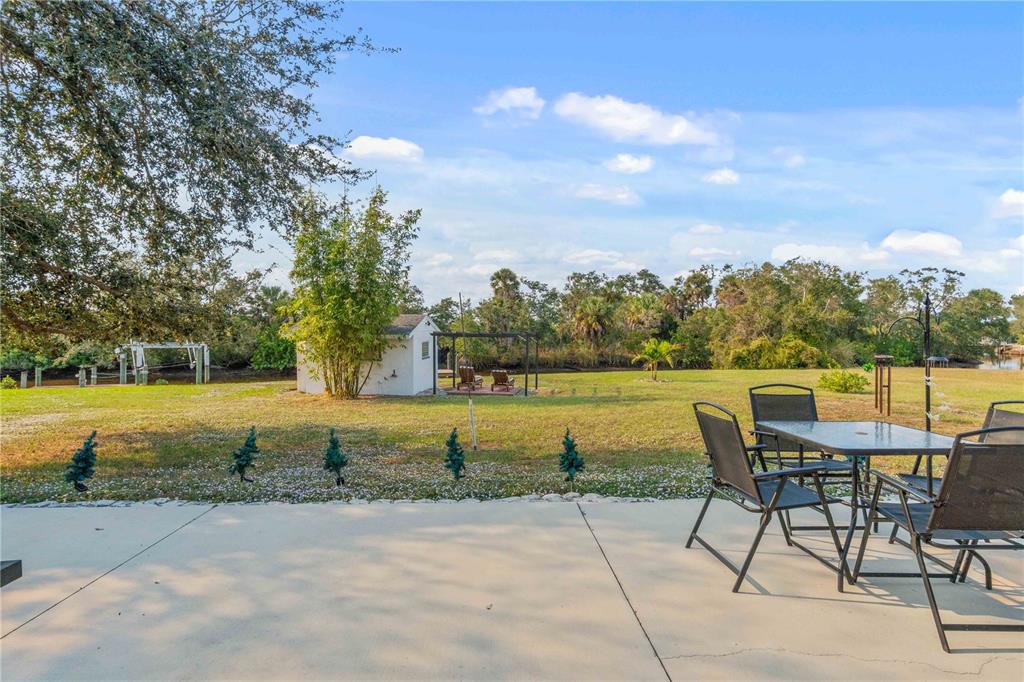333 Hile Lane Punta Gorda, FL 33982 - Photo 53 of 72 a view of a lake with a yard