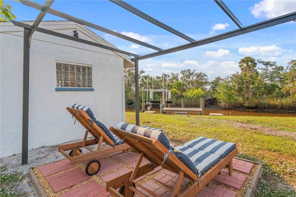 333 Hile Lane Punta Gorda, FL 33982 - Photo 56 of 72 a view of a swimming pool and lounge chairs