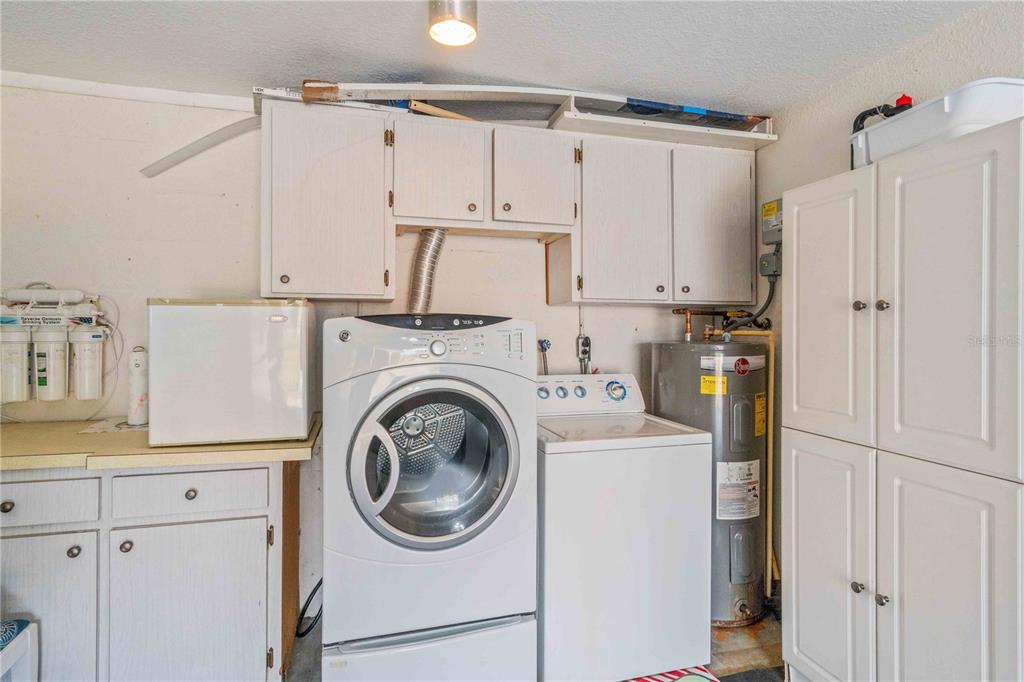 333 Hile Lane Punta Gorda, FL 33982 - Photo 63 of 72 a view of a kitchen with refrigerator and cabinets