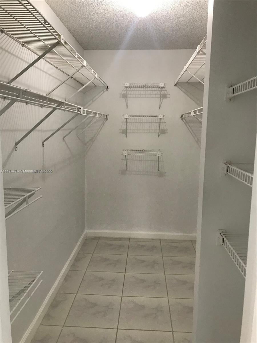 4172 Inverrary Drive, Unit 101 Lauderhill, FL 33319 - Photo 22 of 32 a bathroom with a shower