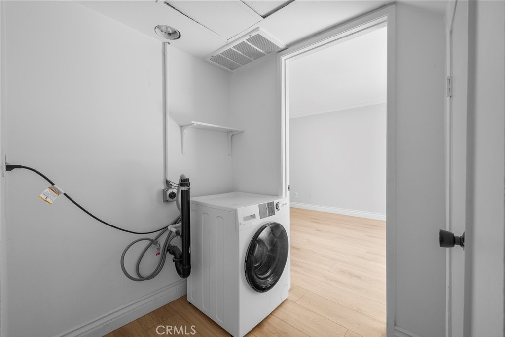 2700 North Brea Boulevard, Unit 24 Fullerton, CA 92835 - Photo 11 of 27 a utility room with dryer and washer