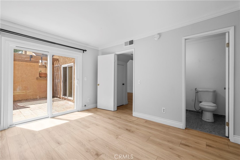 2700 North Brea Boulevard, Unit 24 Fullerton, CA 92835 - Photo 15 of 27 a view of a room with a windows and a bathroom