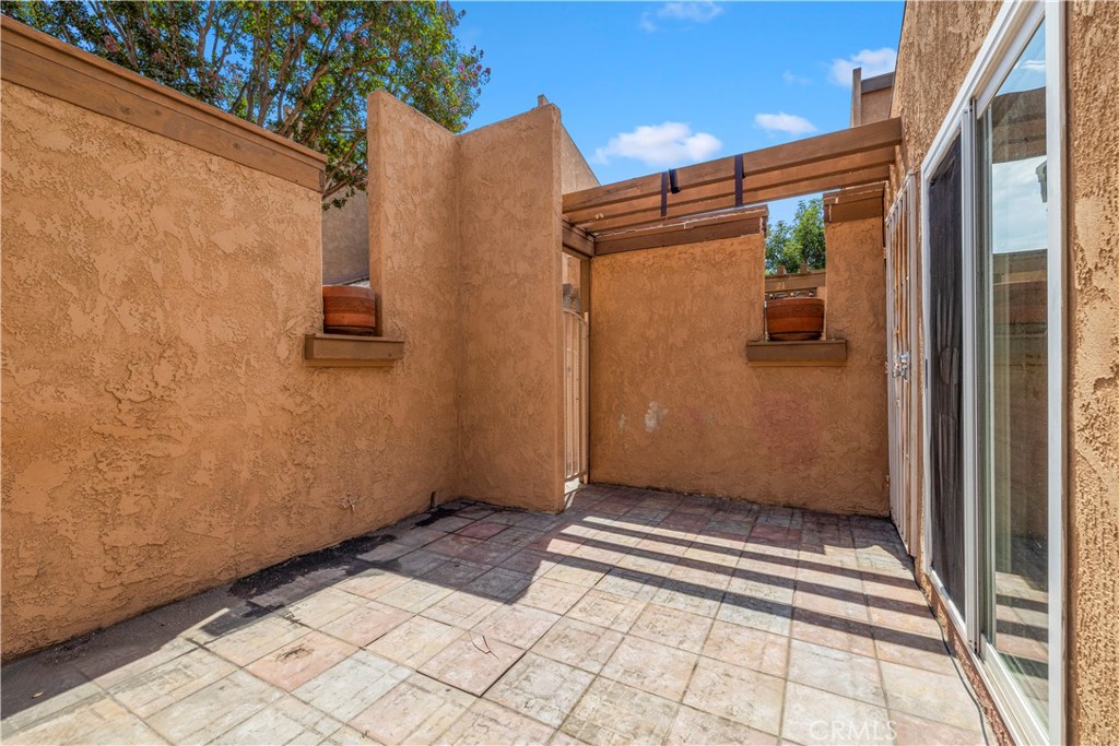 2700 North Brea Boulevard, Unit 24 Fullerton, CA 92835 - Photo 3 of 27 a view of a door and wooden floor