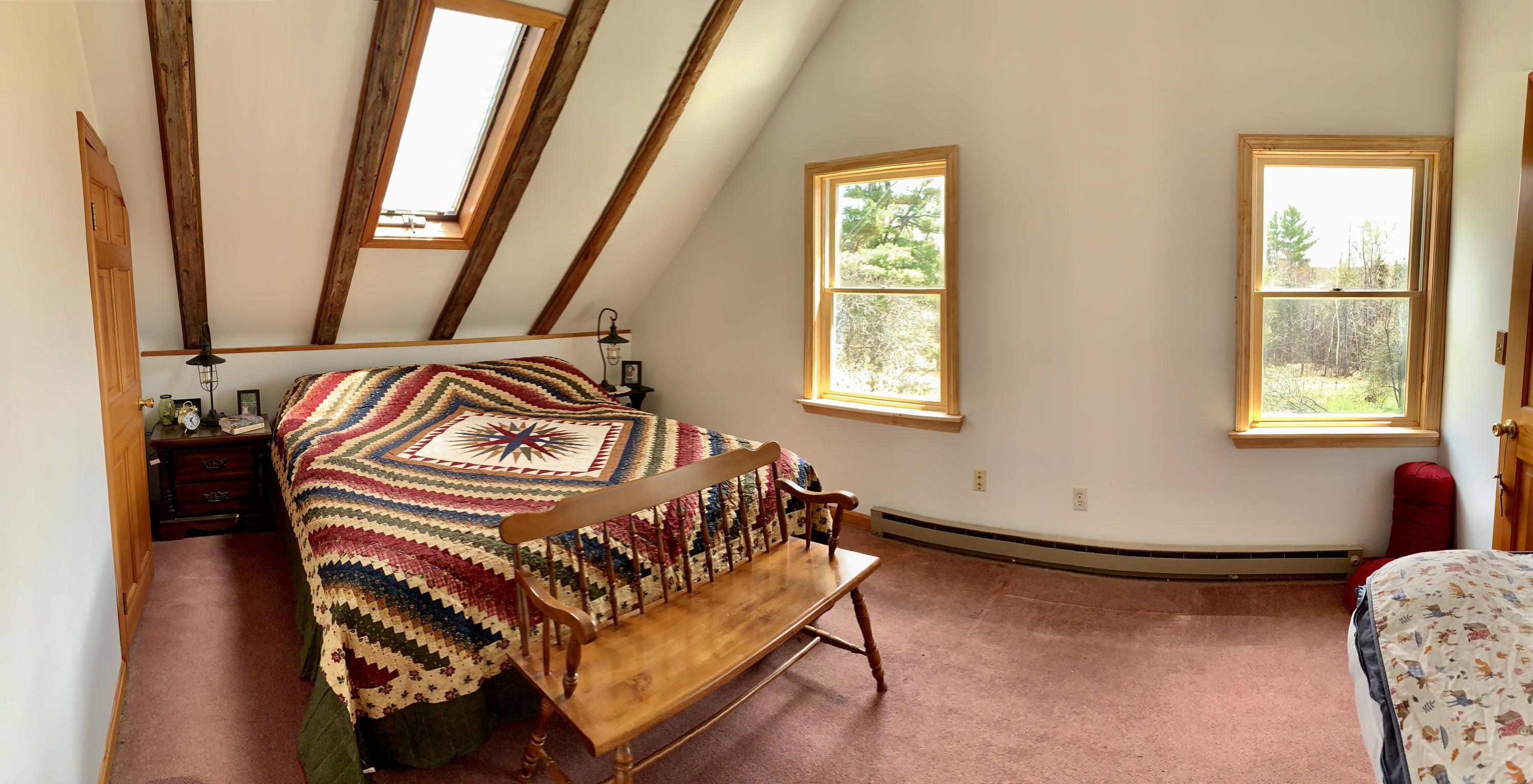 341 Schoodic Lake Road Brownville, ME 04414 - Photo 20 of 56 Master Bedroom w/Skylight