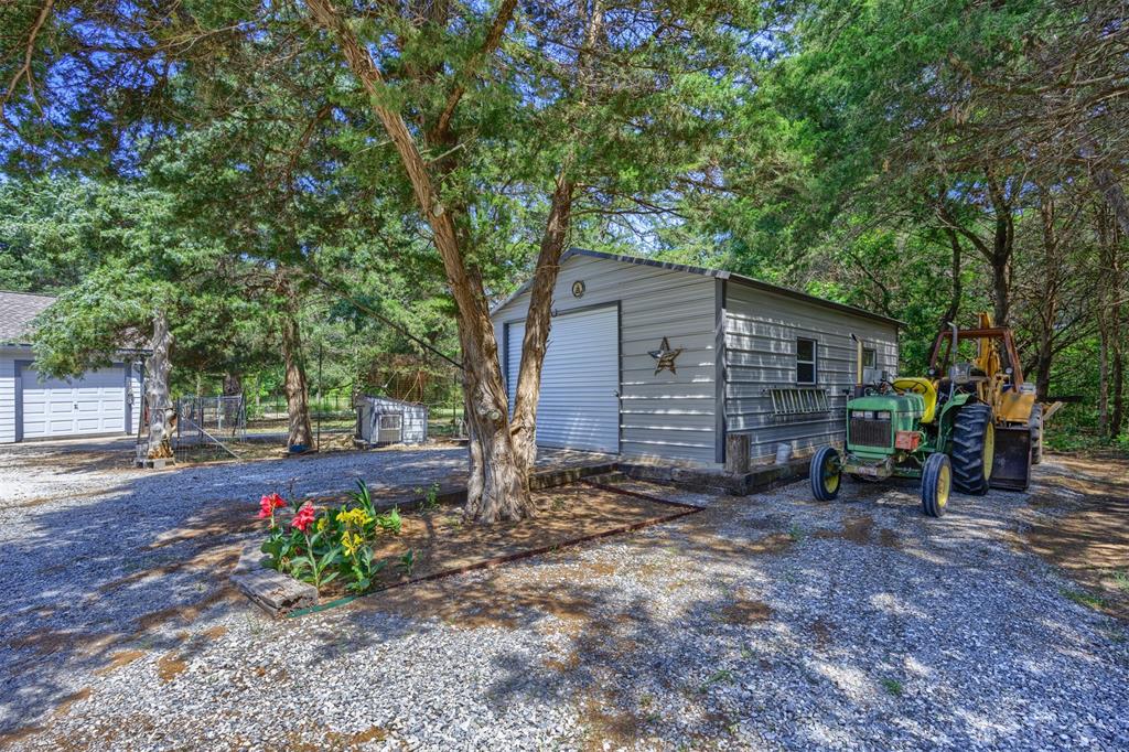 881 Wild Road Van Alstyne, TX 75495 - Photo 37 of 40 a front view of a house with a yard
