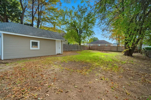 a view of a backyard with a garden