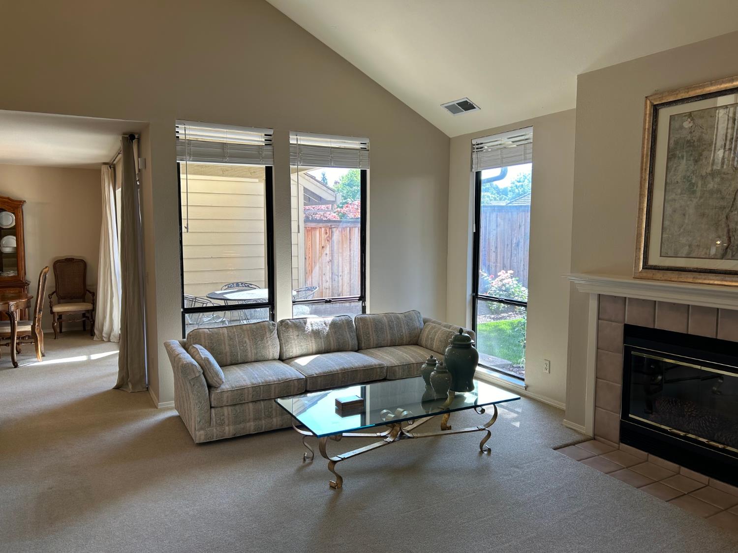 1067 Rio Cidade Way Sacramento, CA 95831 - Photo 5 of 33 a living room with furniture and a fireplace