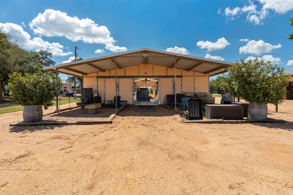 3550 County Road 245 Florence, TX 76527 - Photo 20 of 38 Covered space at the back of the barn offering wash area, holding area, also easy to convert into other possible options. This property is a Rare Find & Lucrative Investment in the Georgetown ISD this close to Austin, Texas!