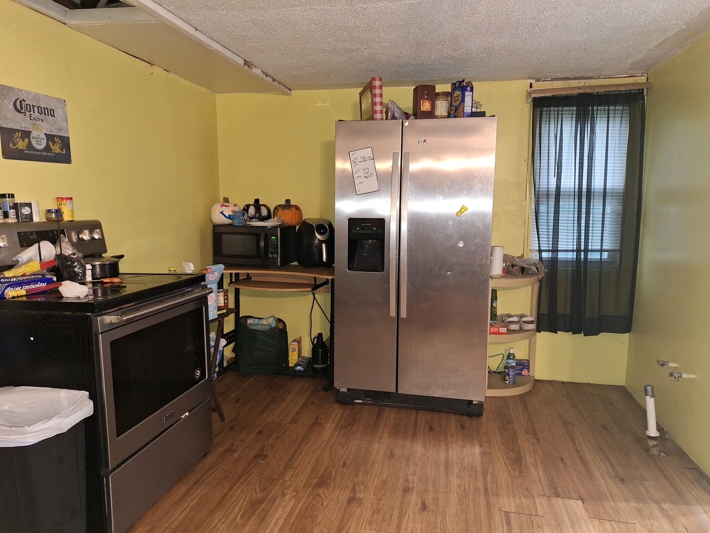 1505 North Otter Creek Road Streator, IL 61364 - Photo 19 of 40 a kitchen with a refrigerator and a stove