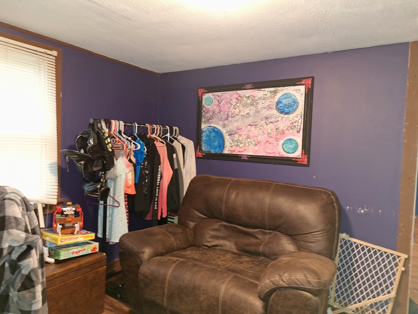 1505 North Otter Creek Road Streator, IL 61364 - Photo 20 of 40 a bed room with a bed and a painting on the wall