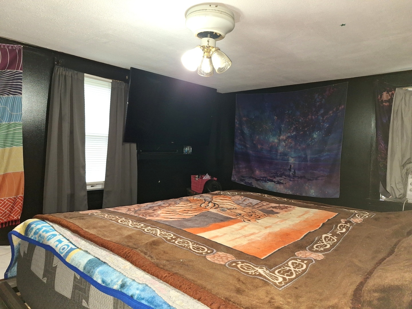 1505 North Otter Creek Road Streator, IL 61364 - Photo 22 of 40 a bedroom with a bed and a chandelier