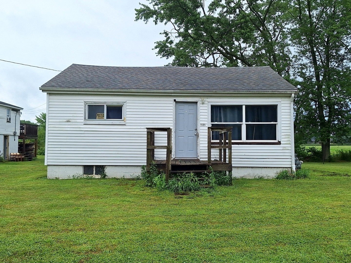 1505 North Otter Creek Road Streator, IL 61364 - Photo 39 of 40 a front view of a house with a yard