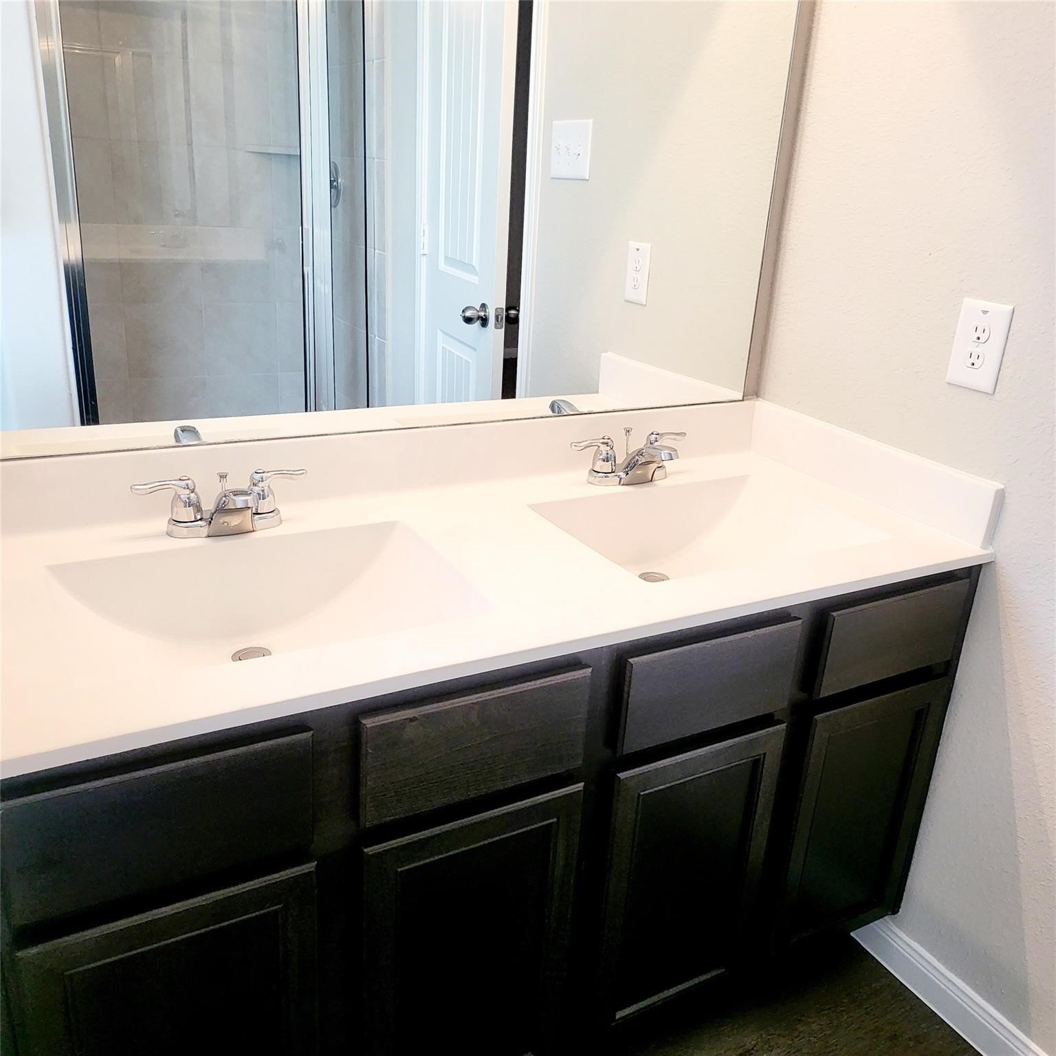 22114 Imperious Park Way Houston, TX 77073 - Photo 9 of 16 a bathroom with a sink and a mirror